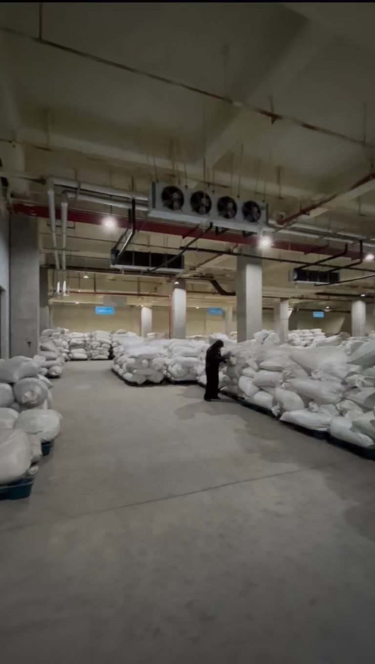 Tea storage room with stacked product and ceiling-mounted air coolers